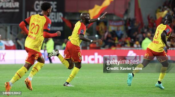 Captain, Seko Fofana of Lens celebrate his first goal with teammates during the Ligue 1 match between RC Lens and Olympique Marseille at Stade...