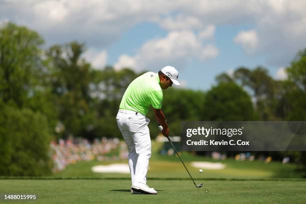 Kyoung-Hoon Lee of South Korea plays his shot from the 13th tee during the third round of the Wells Fargo Championship at Quail Hollow Country Club...