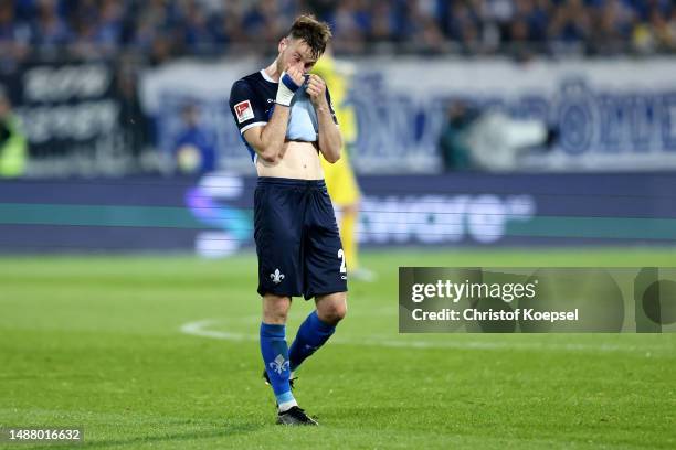 Matthias Bader of Darmstadt looks dejected afteer losing 0-3 the Second Bundesliga match between SV Darmstadt 98 and FC St. Pauli at Merck-Stadion am...