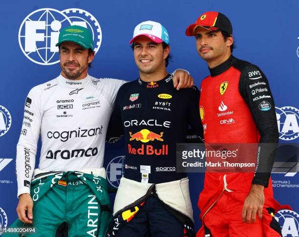 Pole position qualifier Sergio Perez of Mexico and Oracle Red Bull Racing , Second placed qualifier Fernando Alonso of Spain and Aston Martin F1 Team...