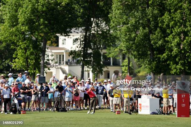 Adam Scott of Australia plays his shot from the 17th tee during the third round of the Wells Fargo Championship at Quail Hollow Country Club on May...