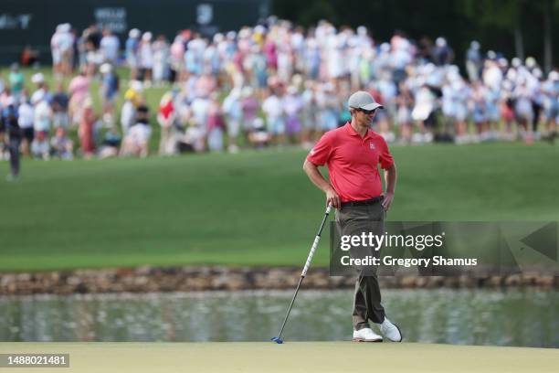 Adam Scott of Australia looks on over the 17th green during the third round of the Wells Fargo Championship at Quail Hollow Country Club on May 06,...