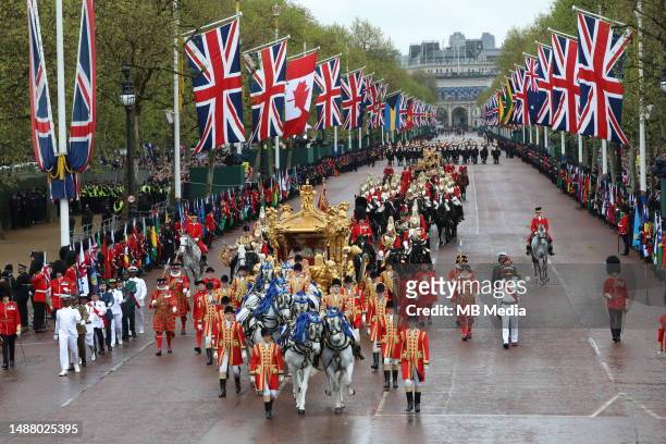 The military procession, the largest of its kind since the 1953 Coronation of Her Majesty Queen Elizabeth II, makes its way down The Mall towards...