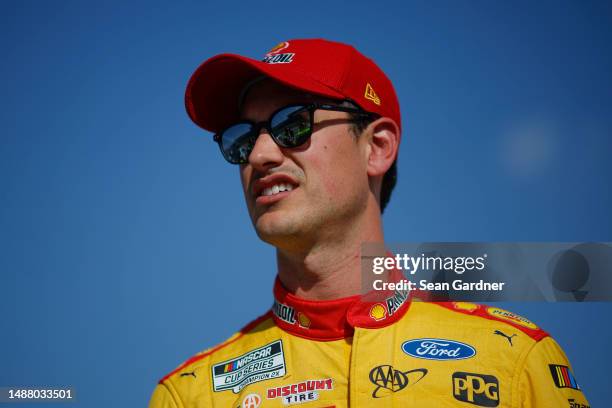 Joey Logano, driver of the Shell Pennzoil Ford, waits on the grid during qualifying for the NASCAR Cup Series Advent Health 400 at Kansas Speedway on...