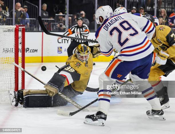 Leon Draisaitl of the Edmonton Oilers scores a first-period power-play goal against Laurent Brossoit of the Vegas Golden Knights in Game Two of the...