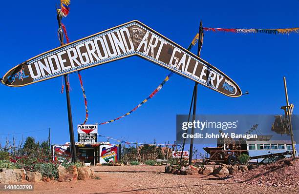 the underground gallery entrance in coober pedy. most establishments are underground as temperatures above ground, can reach over 50 degrees in summer - coober pedy stock pictures, royalty-free photos & images