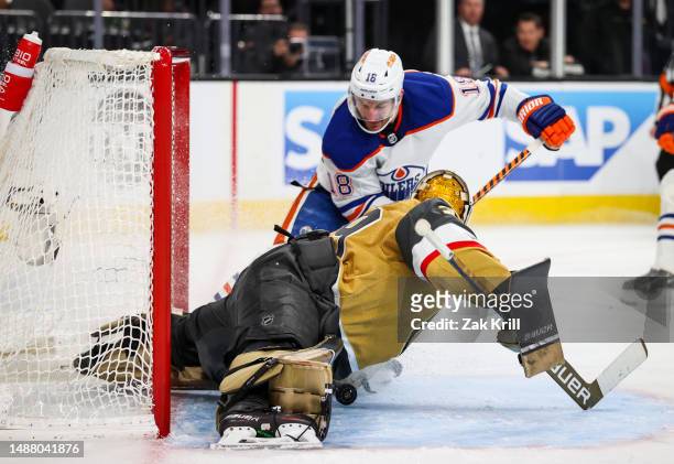 Laurent Brossoit of the Vegas Golden Knights makes a save against Zach Hyman of the Edmonton Oilers during the second period in Game Two of the...