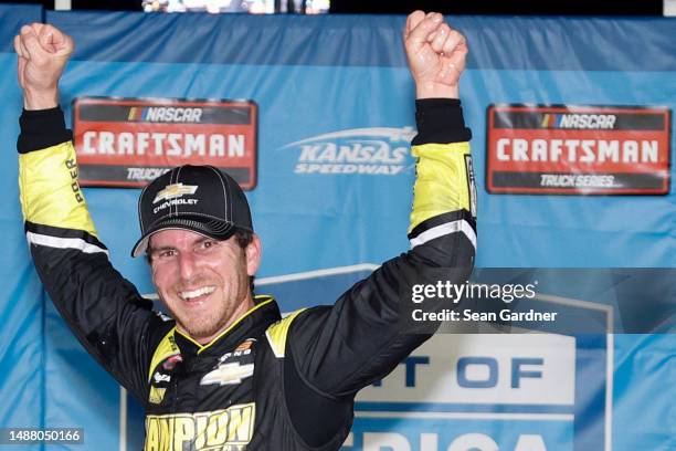 Grant Enfinger, driver of the Chevy Military Appreciation Chevrolet, celebrates in victory lane after winning the NASCAR Craftsman Truck Series Heart...