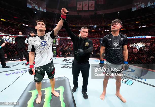 Movsar Evloev of Russia reacts after his victory over Diego Lopes of Brazil in a featherweight fight during the UFC 288 event at Prudential Center on...