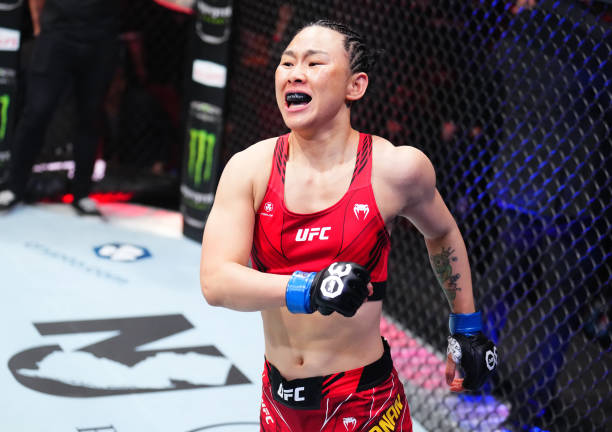 Yan Xiaonan of China reacts after her knockout victory over Jessica Andrade of Brazil in a strawweight fight during the UFC 288 event at Prudential...