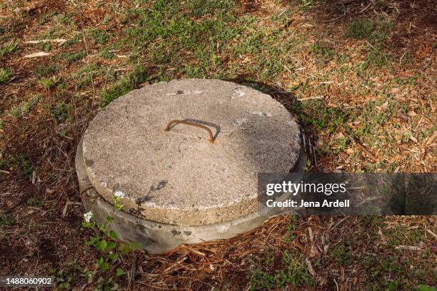 septic tank concrete, sewage environmental issues, waste management and home owner problems - septic tank stock pictures, royalty-free photos & images