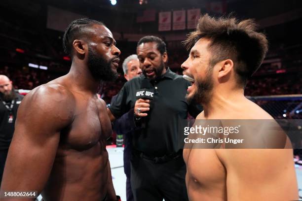 Opponents Aljamain Sterling and Henry Cejudo face off prior to the UFC bantamweight championship fight during the UFC 288 event at Prudential Center...