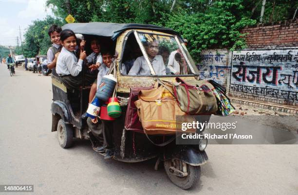 India Children In Auto Rickshaw Photos and Premium High Res Pictures ...