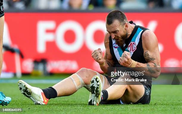 Charlie Dixon of Port Adelaide celebrates a goal during the round eight AFL match between Port Adelaide Power and Essendon Bombers at Adelaide Oval,...