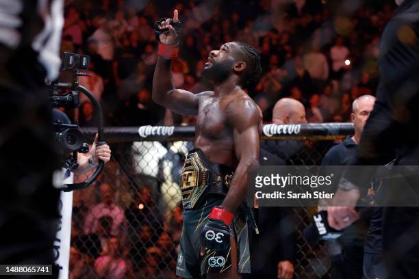 Aljamain Sterling of Jamaica celebrates his victory over Henry Cejudo during their bantamweight title bout at UFC 288 at Prudential Center on May 06,...