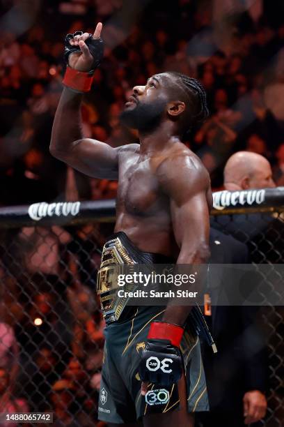 Aljamain Sterling of Jamaica celebrates his victory over Henry Cejudo during their bantamweight title bout at UFC 288 at Prudential Center on May 06,...