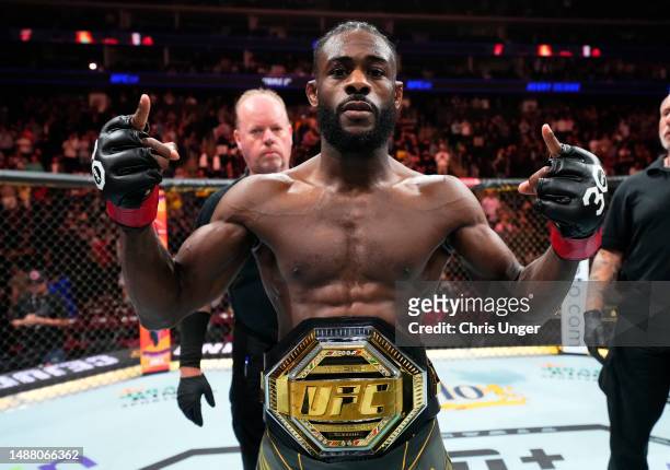 Aljamain Sterling react after his victory over Henry Cejudo in the UFC bantamweight championship fight during the UFC 288 event at Prudential Center...