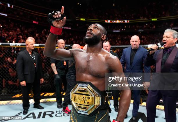 Aljamain Sterling react after his victory over Henry Cejudo in the UFC bantamweight championship fight during the UFC 288 event at Prudential Center...