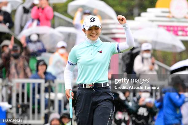 Yuri Yoshida of Japan celebrates winning the tournament on the 18th green during the final round of World Ladies Championship Salonpas Cup at Ibaraki...