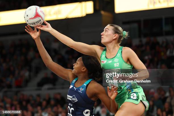 Mwai Kumwenda of the Vixens and Courtney Bruce of the Fever compete for the ball during the round eight Super Netball match between Melbourne Vixens...