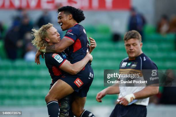 Carter Gordon of the Rebels celebrates scoring a try during the round 11 Super Rugby Pacific match between Melbourne Rebels and ACT Brumbies at AAMI...