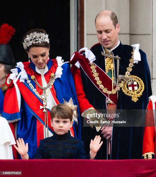 Catherine, Princess of Wales, Prince Louis of Wales, Prince William, Prince of Wales on the balcony of Buckingham Palace, London, following the...