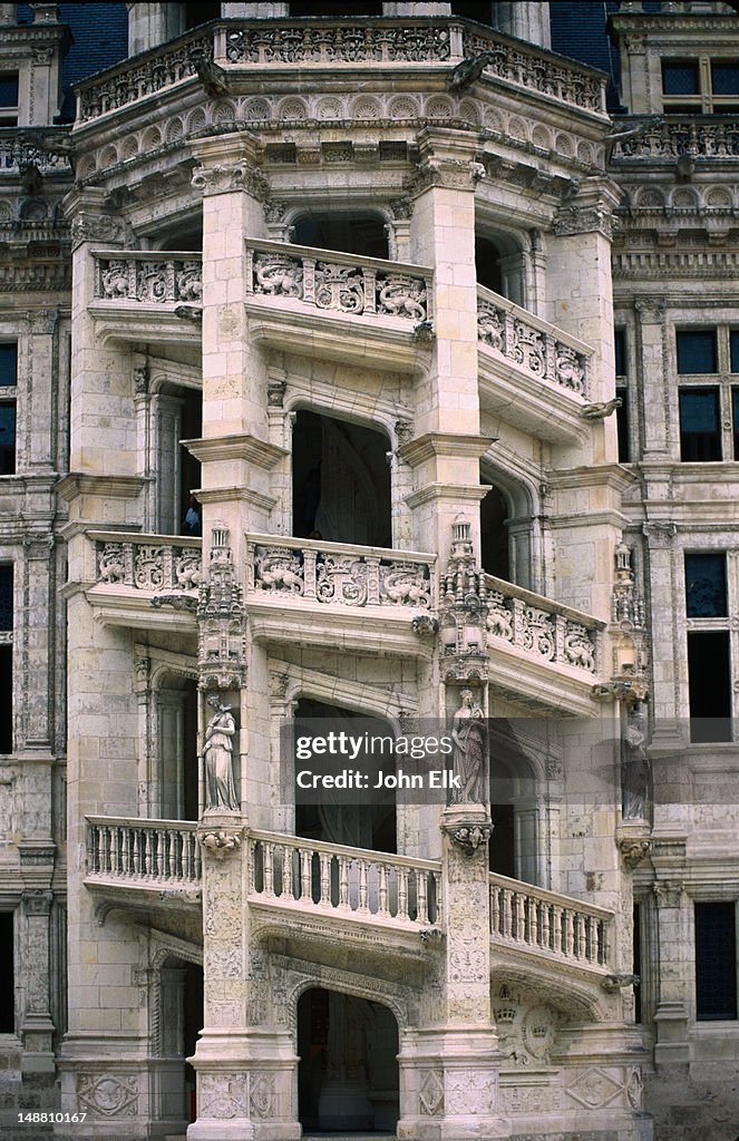 The famous spiral staircase of Chateau de Blois, a magnificent structure decorated with repetitions of Francois I's insignia, a capital F and salamanders, Loire Valley