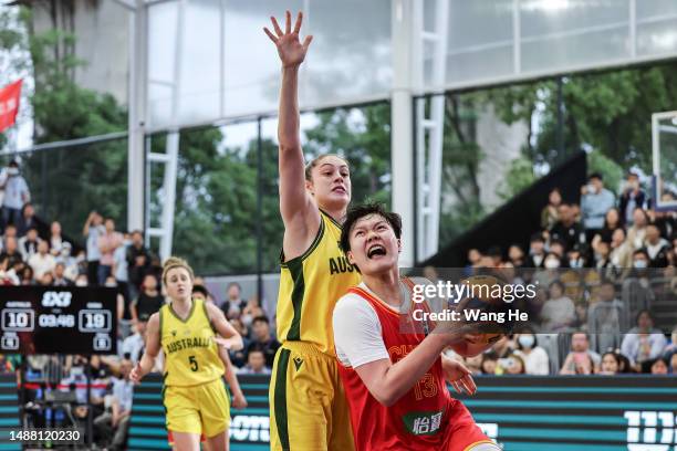 Wan Jiyuan of China and Chloe Louise Bibby in action during the finals game of FIBA 3x3 Women’s Series Wuhan Stop 2023, the match between China and...