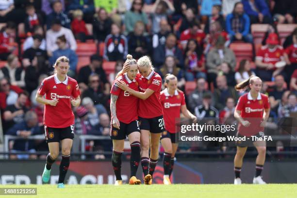 Leah Galton of Manchester United celebrates with teammate Millie Turner after scoring the team's first goal during the FA Women's Super League match...