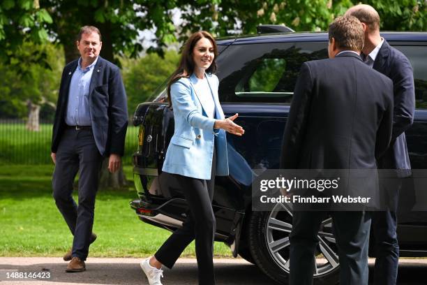 Catherine, Princess of Wales greets people during a walkabout meeting members of the public on the Long Walk near Windsor Castle, where the...