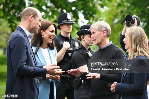 Prince William, Prince of Wales and Catherine, Princess of Wales meet people during a walkabout at The Big Lunch in Windsor, during the Coronation of...