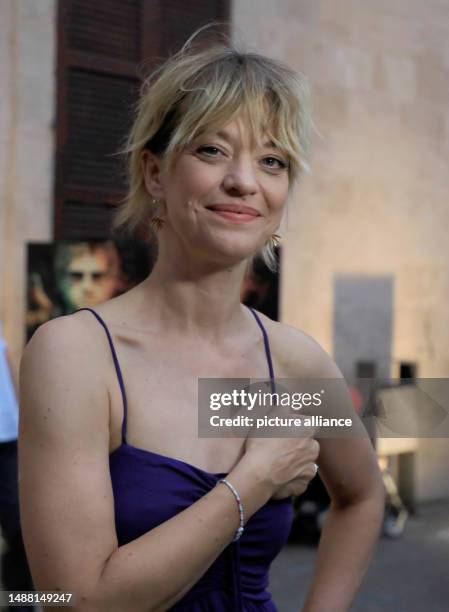 July 2023, Spain, Palma: Heike Makatsch, actress, attends the premiere of the TV series "King of Palma" in the courtyard of the Misericordia Church...
