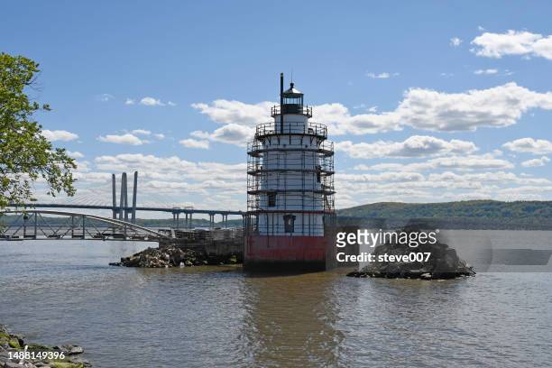 restoration of the tarrytown lighthouse also known as the sleepy hollow lighthouse. - tarrytown stock pictures, royalty-free photos & images
