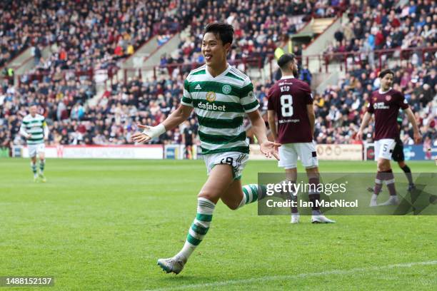 Oh Hyeon-Gyu of Celtic celebrates after scoring the team's second goal during the Cinch Scottish Premiership match between Heart of Midlothian and...