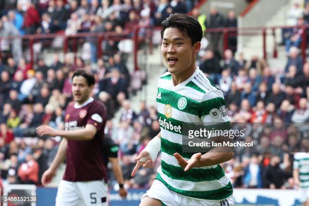 Oh Hyeon-Gyu of Celtic celebrates after scoring the team's second goal during the Cinch Scottish Premiership match between Heart of Midlothian and...