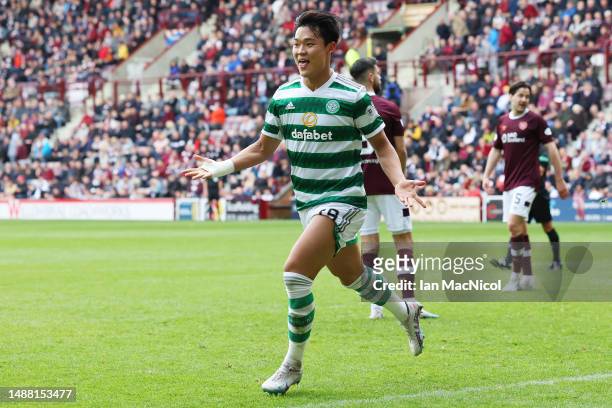 Oh Hyeon-Gyu of Celtic celebrates after scoring the team's second goal during the Cinch Scottish Premiership match between Heart of Midlothian and...