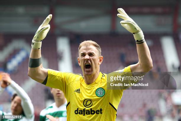 Joe Hart of Celtic, celebrates after winning the Cinch Scottish Premiership following the match between Heart of Midlothian and Celtic FC at...