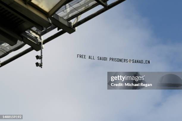 Plane flies over St. James Park towing a banner which reads "Free All Saudi Prisoners @Sanad_en" prior to the Premier League match between Newcastle...