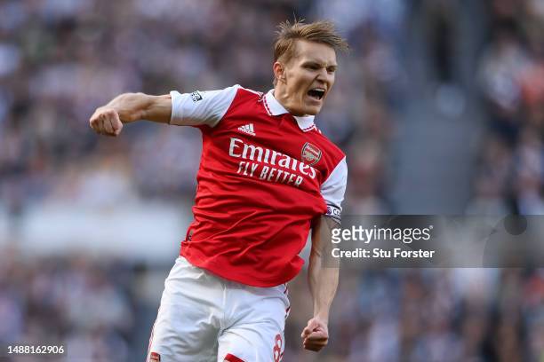 Martin Odegaard of Arsenal celebrates after scoring the team's first goal during the Premier League match between Newcastle United and Arsenal FC at...