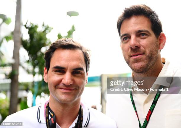 Roger Federer and Juan Martin Del Potro talk in the Paddock prior to the F1 Grand Prix of Miami at Miami International Autodrome on May 07, 2023 in...