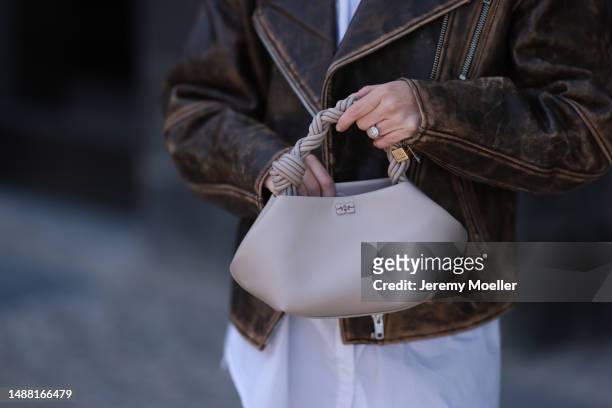 Marlies Pia Pfeifhofer seen wearing LeGer by Lena Gercke white long button shirt / short dress, H&M Studio brown faded leather jacket, GANNI light...