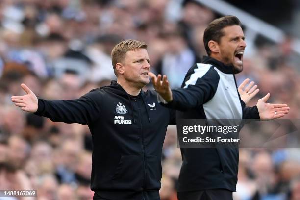 Eddie Howe, Manager of Newcastle United, and Jason Tindall, Assistant Manager of Newcastle United, react during the Premier League match between...