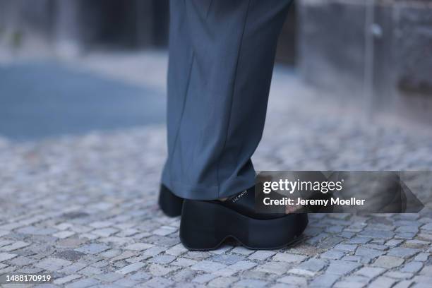 Anna Winter seen wearing Birgitte Herskind grey long skirt, Vic Matié black leather plateau / platform sandals, on May 03, 2023 in Berlin, Germany.