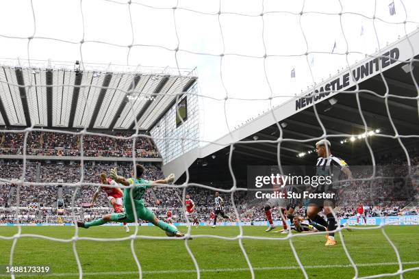 General view as Nick Pope of Newcastle United saves a shot from Martin Odegaard of Arsenal during the Premier League match between Newcastle United...