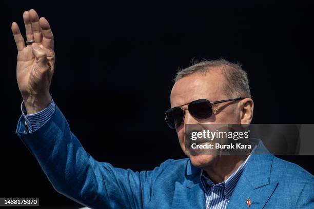 Turkey's President Recep Tayyip Erdogan greets his supporters at a rally while campaigning for the presidential election on May 07, 2023 in Istanbul,...