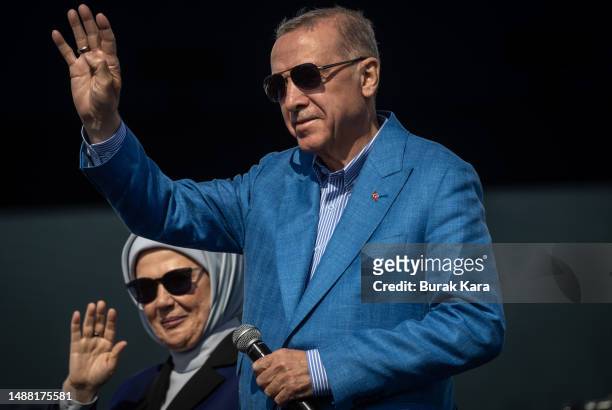 Turkey's President Recep Tayyip Erdogan and his wife Emine Erdogan greets to supporters during a AK Parti election rally on J on May 07, 2023 in...