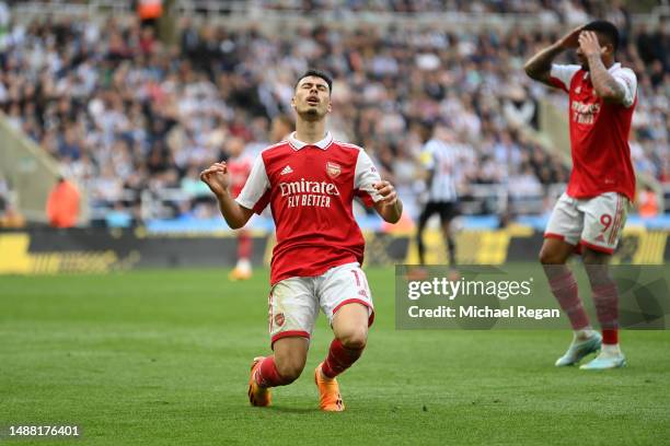 Gabriel Martinelli of Arsenal reacts after their shot hits the bar during the Premier League match between Newcastle United and Arsenal FC at St....