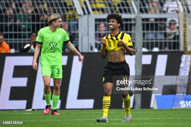 Karim Adeyemi of Borussia Dortmund reacts after missing a penalty kick during the Bundesliga match between Borussia Dortmund and VfL Wolfsburg at...
