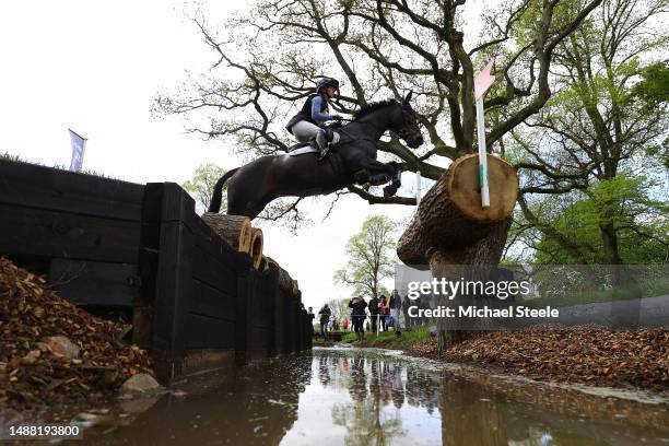 Rosalind Canter of Great Britain riding Pencos Crown Jewel clears the 11th fence during the Cross Country day of the Badminton Horse Trials at...