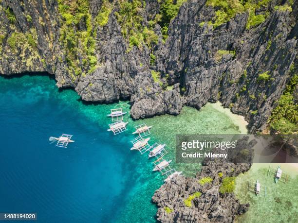 palawan secret lagoon el nido miniloc island philippines - mlenny stock pictures, royalty-free photos & images